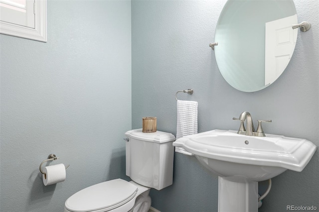 3433 N Wabash St, Denver, CO 80238 - half bath with toilet and a sink