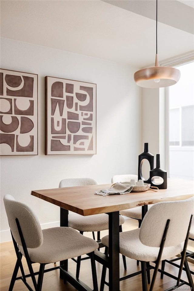 dining room featuring wood-type flooring