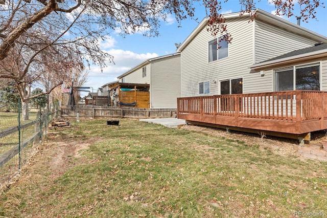 back of property with a deck
