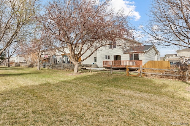 view of yard featuring a wooden deck