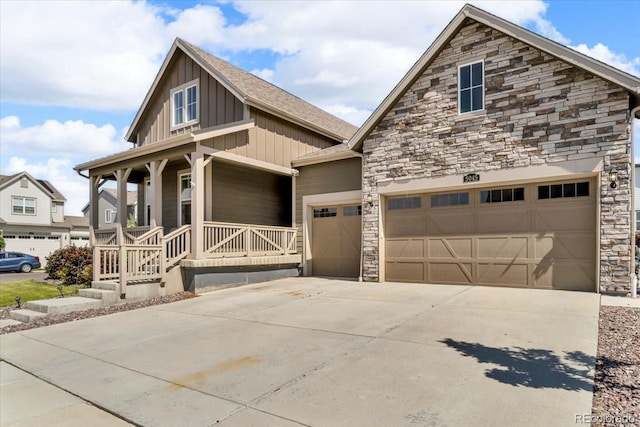 5045 Preserve Pl, Firestone, CO 80504 - craftsman inspired home with board and batten siding, stone siding, covered porch, concrete driveway, and a garage
