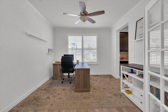 5045 Preserve Pl, Firestone, CO 80504 - office area featuring crown molding, a ceiling fan, and light wood finished floors