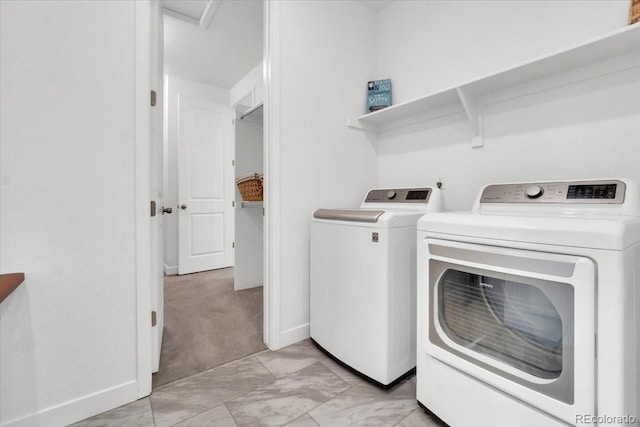 5045 Preserve Pl, Firestone, CO 80504 - washroom with independent washer and dryer and light marble finish floors