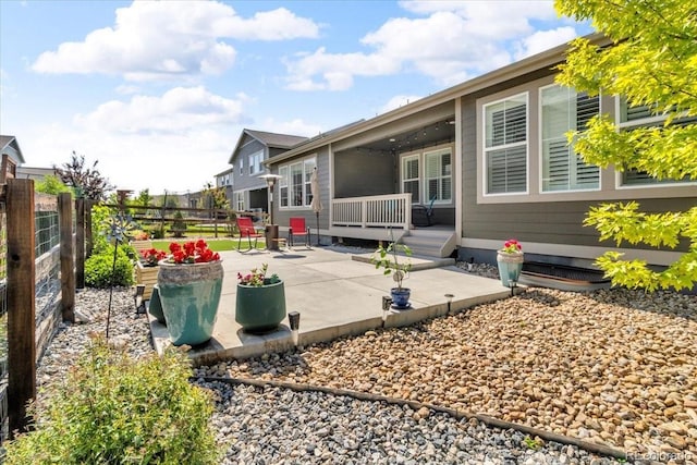 5045 Preserve Pl, Firestone, CO 80504 - fenced backyard featuring a patio area and a deck