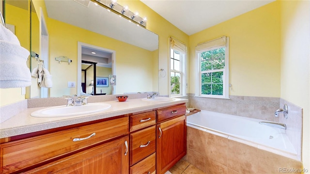 bathroom featuring double vanity, a garden tub, and tile patterned flooring