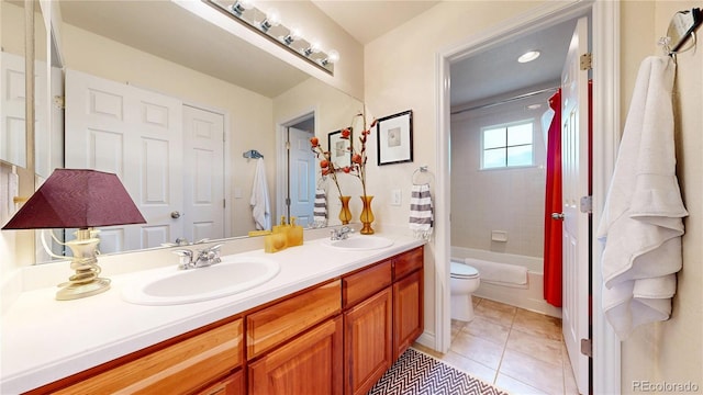 bathroom featuring toilet, double vanity, shower / bath combination with curtain, and tile patterned flooring