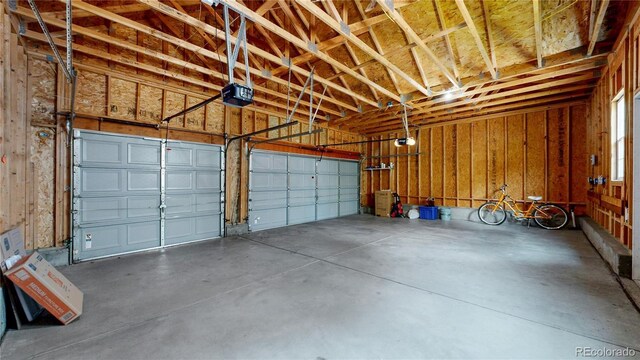 garage featuring a garage door opener
