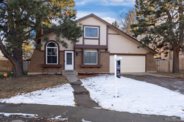 view of front of property featuring a garage