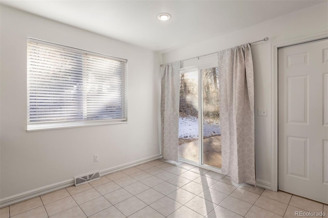 view of tiled spare room