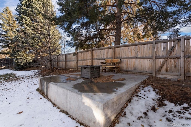 view of yard covered in snow