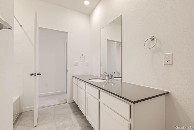 full bathroom featuring vanity