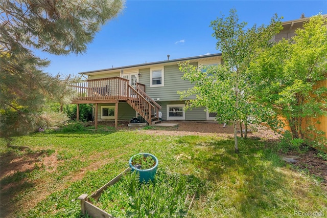 18771 Mexico Dr E, Aurora, CO 80017 - rear view of property featuring a deck and stairway