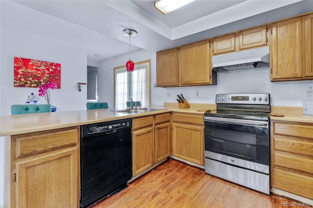 18771 Mexico Dr E, Aurora, CO 80017 - kitchen featuring under cabinet range hood, black dishwasher, stainless steel range with electric stovetop, a sink, and a peninsula