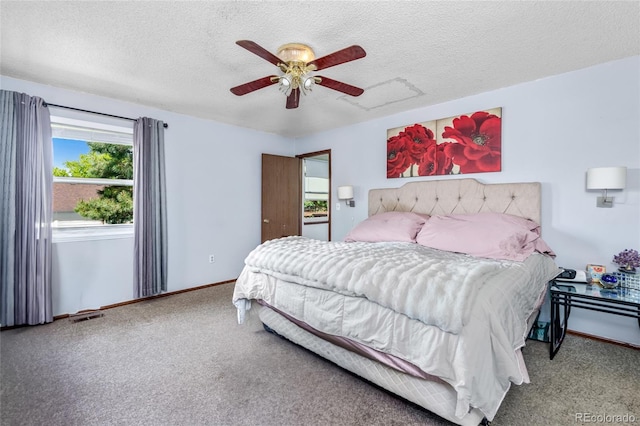 18771 Mexico Dr E, Aurora, CO 80017 - bedroom with carpet, a textured ceiling, baseboards, and ceiling fan