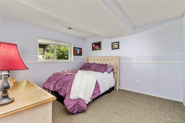 18771 Mexico Dr E, Aurora, CO 80017 - bedroom with carpet floors, a textured ceiling, and baseboards