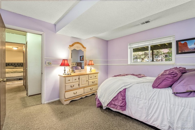 18771 Mexico Dr E, Aurora, CO 80017 - carpeted bedroom featuring a textured ceiling