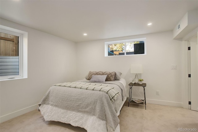 bedroom with light carpet