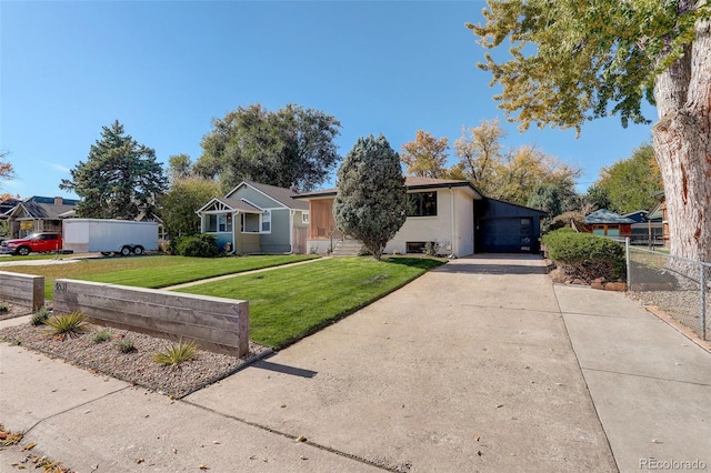 view of front of property with a carport and a front yard