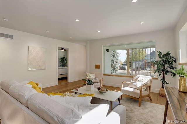 living room with light hardwood / wood-style floors