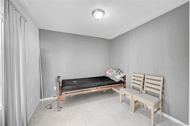 1550 S Telluride St, Aurora, CO 80017 - bedroom with tile patterned floors and baseboards