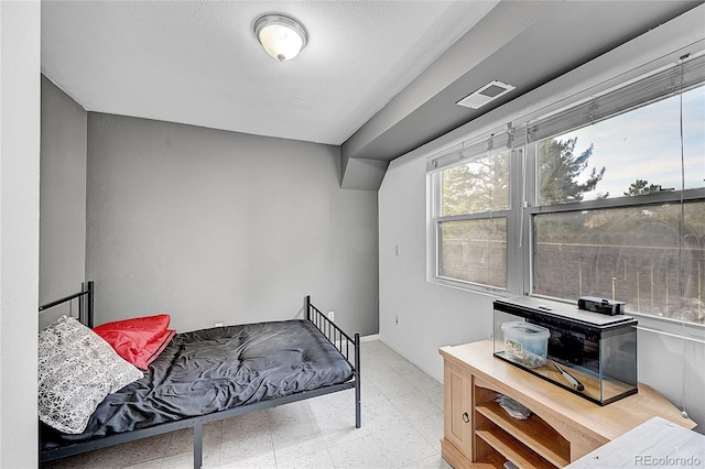 bedroom with a textured ceiling