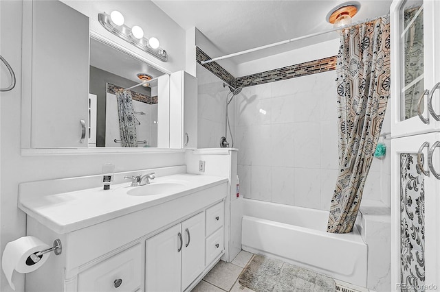 bathroom with vanity, shower / tub combo with curtain, and tile patterned flooring