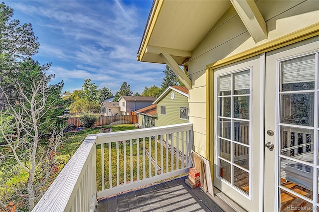 wooden balcony featuring a deck