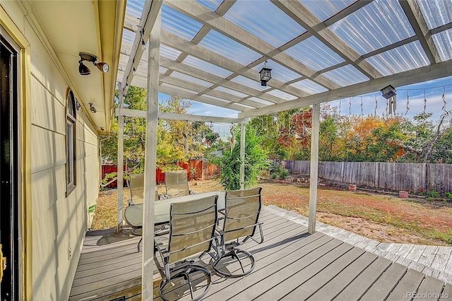 wooden terrace with a pergola