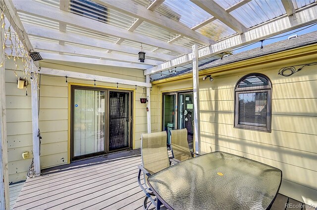 1550 S Telluride St, Aurora, CO 80017 - wooden deck with outdoor dining area and a pergola