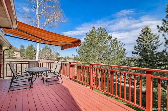 deck featuring outdoor dining space