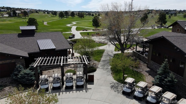 surrounding community featuring view of golf course