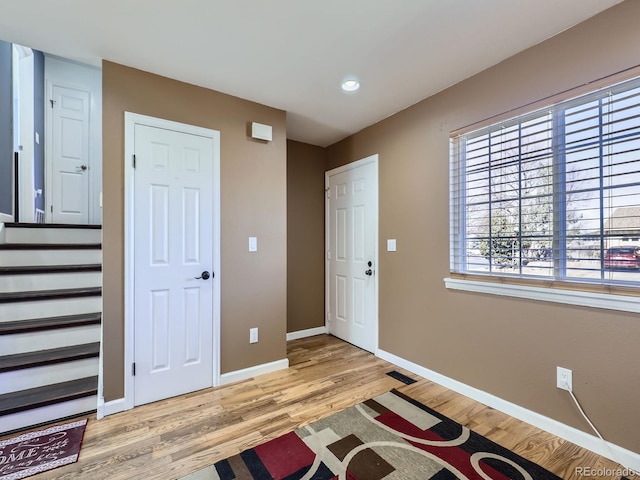 foyer with light hardwood / wood-style flooring