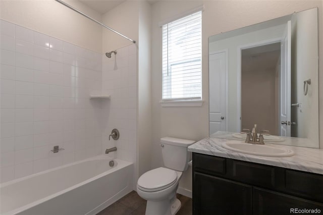 24314 E Ford Ave, Aurora, CO 80018 - bathroom featuring vanity, toilet, shower / bath combination, and plenty of natural light