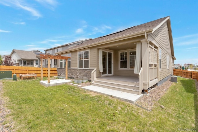 24314 E Ford Ave, Aurora, CO 80018 - back of house featuring a pergola and stone siding