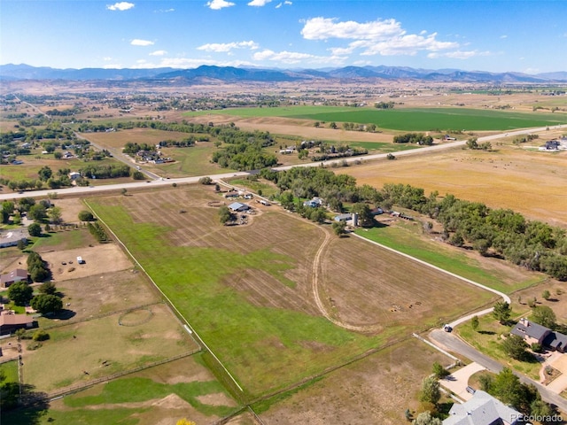 aerial view featuring a mountain view and a rural view