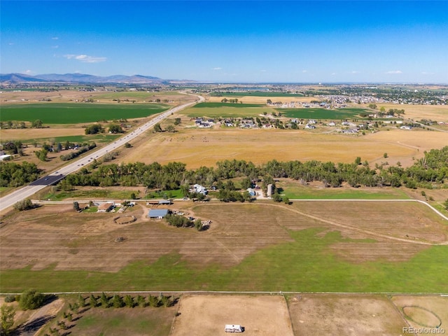 aerial view with a mountain view and a rural view