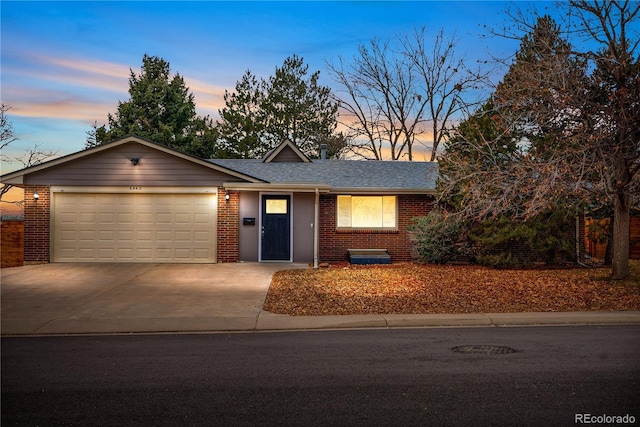 ranch-style house with a garage