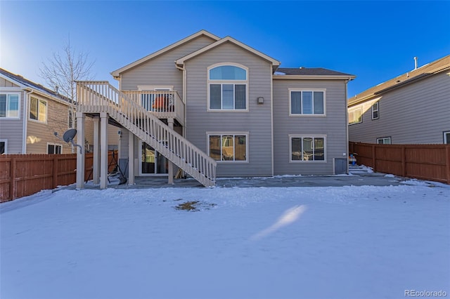 view of snow covered property