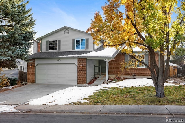 view of front of property with a garage