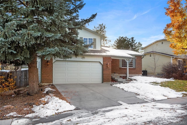 view of front of property featuring a garage