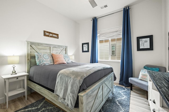 8985 Chalk Creek Pl, Littleton, CO 80125 - bedroom featuring wood finished floors and a ceiling fan