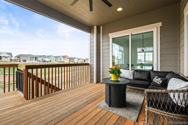 8985 Chalk Creek Pl, Littleton, CO 80125 - deck with outdoor lounge area, a ceiling fan, and a residential view