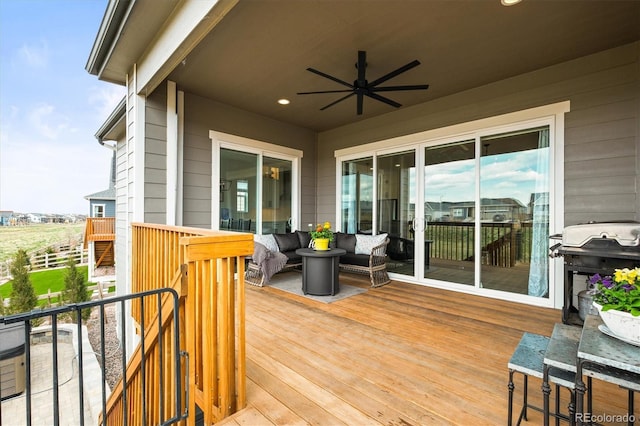 8985 Chalk Creek Pl, Littleton, CO 80125 - wooden deck with a ceiling fan, outdoor lounge area, and grilling area