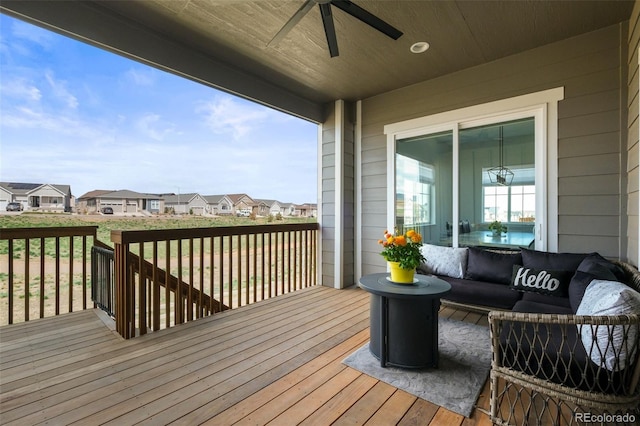 8985 Chalk Creek Pl, Littleton, CO 80125 - deck with a ceiling fan, a residential view, and outdoor lounge area