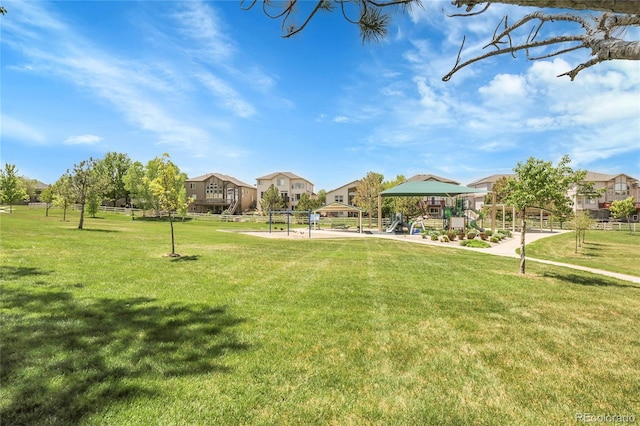5457 S Valdai St, Aurora, CO 80015 - view of community with a lawn and a residential view