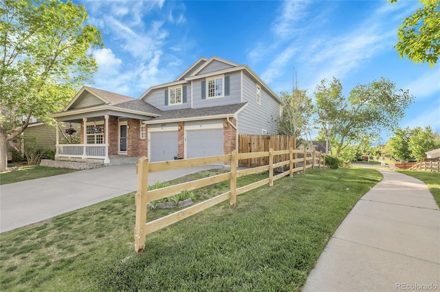 5457 S Valdai St, Aurora, CO 80015 - view of front facade featuring brick siding, covered porch, driveway, and an attached garage