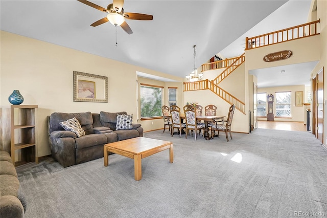 5457 S Valdai St, Aurora, CO 80015 - living area featuring high vaulted ceiling, carpet flooring, plenty of natural light, a ceiling fan, and stairway