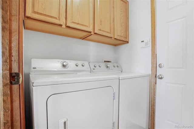 5457 S Valdai St, Aurora, CO 80015 - washroom with washer and clothes dryer and cabinet space