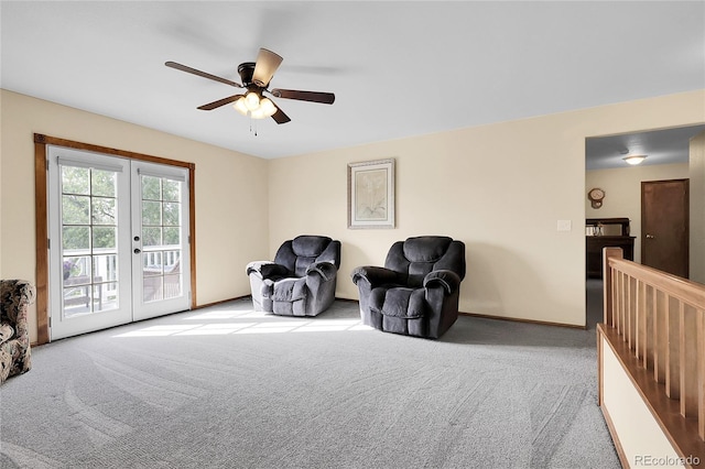 5457 S Valdai St, Aurora, CO 80015 - living area with carpet flooring, french doors, a ceiling fan, and baseboards