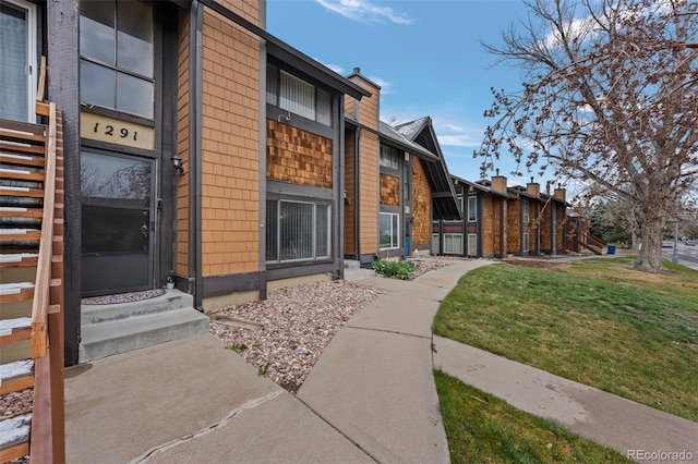 exterior space with a yard